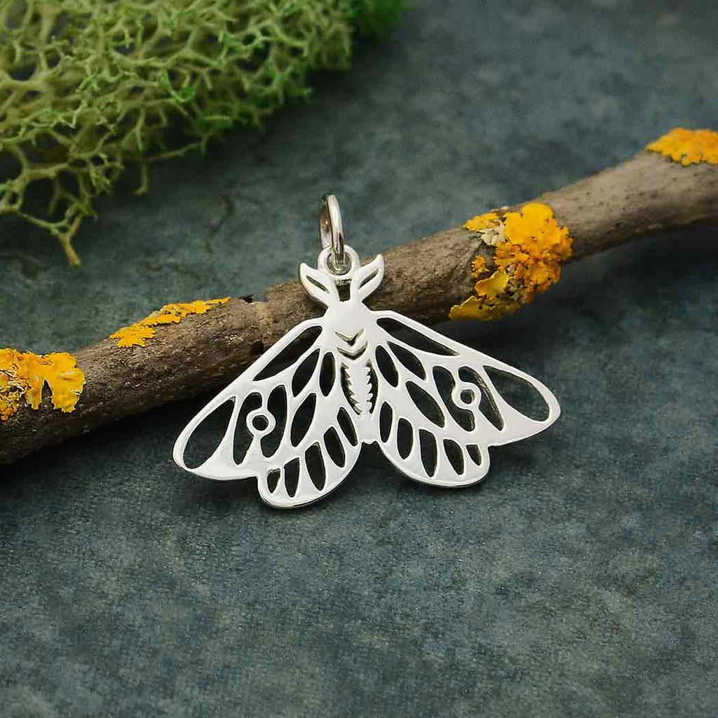 Openwork moth charm-1885